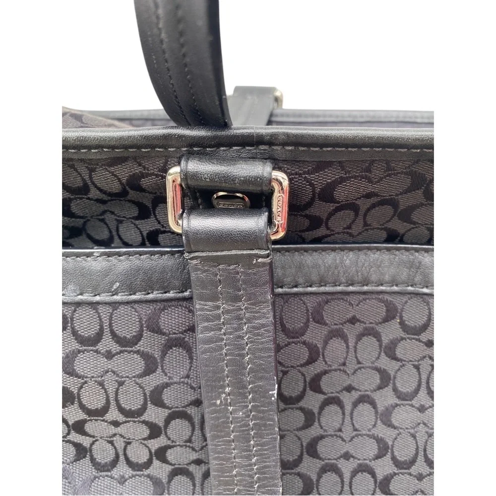Coach Black Baby Bag with Textured Material and Sturdy Handles signature